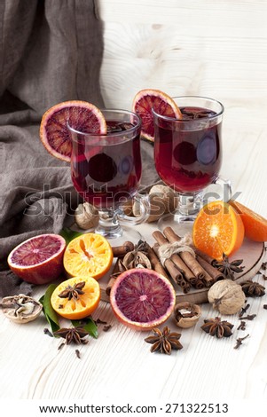 Glass with mulled wine and spices
