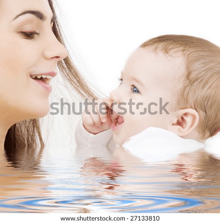 picture of happy mother with baby in water