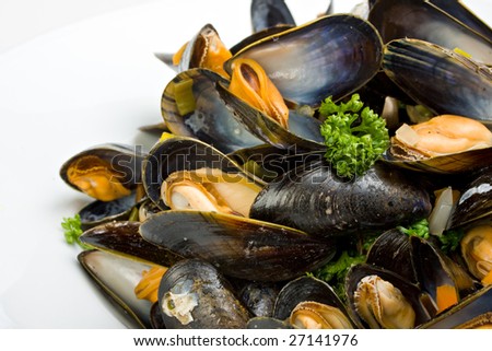 cooked open blue mussels on white background Royalty-Free Stock Photo #27141976