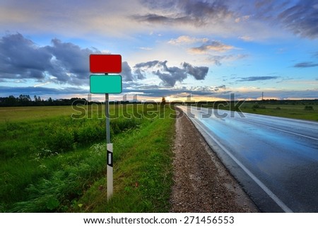 classic scene of a highway in rural area with blank road signs