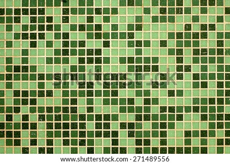 Photo of a Wall Made of Different Hues of Green Tiles Background
