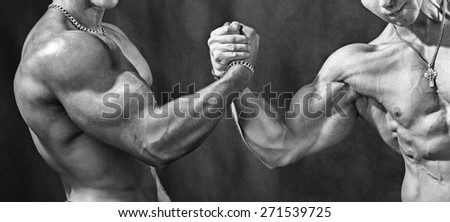 Hello athletes. Two bodybuilder shake hands