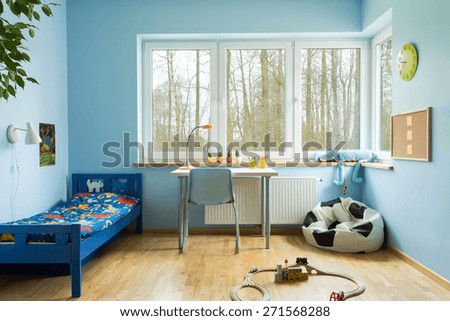 Ball shape sofa in boy toddler room  Royalty-Free Stock Photo #271568288