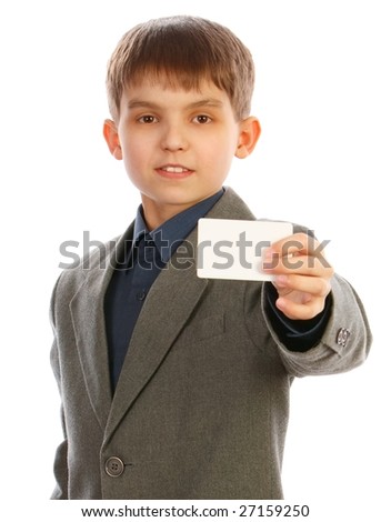 Small boy with a business card. Isolated on white.