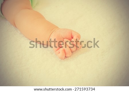 New born baby hand - vintage effect style pictures