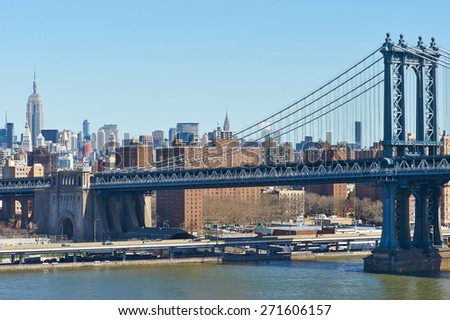 Manhattan Bridge and skyline view from Brooklyn Bridge in New York City
