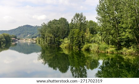 The Serchio river (Lucca, Tuscany, Italy) in a sunny summer morning