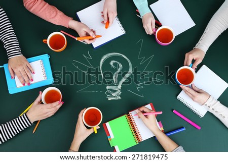 Creative team for work flow on blackboard background top view 
