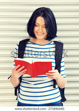 bright picture of attractive woman with bag and book