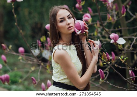 beauty girl near magnolia