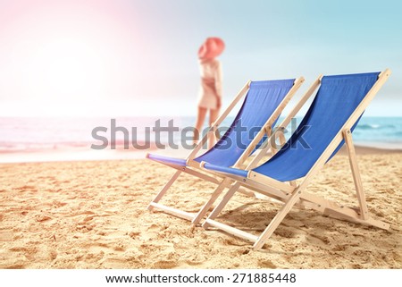 two chairs of summer and woman 