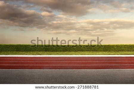 Empty running track for the background with copy space Royalty-Free Stock Photo #271888781