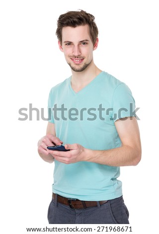 Caucasian man uses mobile phone