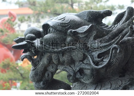 Dragon Head Black Stone Sculpture, Wenwu Temple at Taiwan. Dragon is Symbol of Power and Protection in Chinese Culture.
