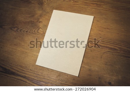 Photo blank. Cover brochure on the wooden background. Vintage style