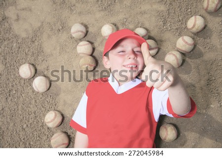 A nice child happy to play baseball
