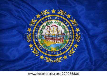 New Hampshire flag on fabric texture,retro vintage style