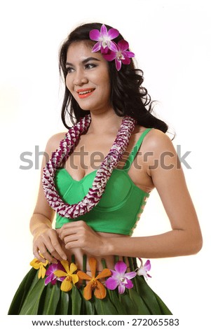 Beautiful woman dress in Hawaiian style with flower lei garland of orchids on white background.