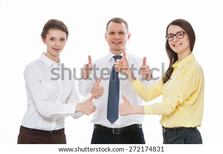 Successful young business people showing thumbs up sign, white background