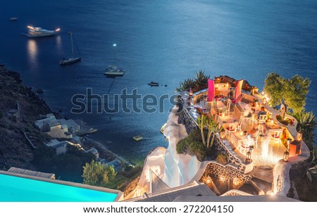 Restaurant terrace over the ocean at night. Luxury and holiday concept. Royalty-Free Stock Photo #272204150