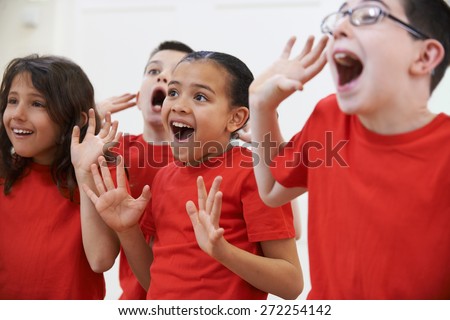 Group Of Children Enjoying Drama Class Together Royalty-Free Stock Photo #272254142
