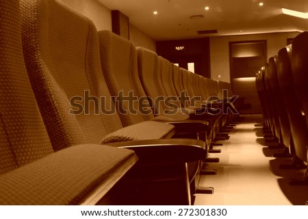 chairs in a theatre, closeup of photo