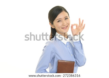 Business woman with ok hand sign
