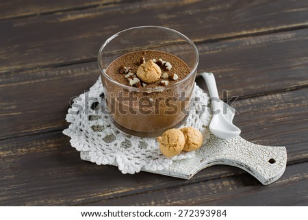Chocolate mousse with almond cookies. Selective focus.