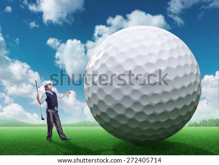 Businessman playing golf