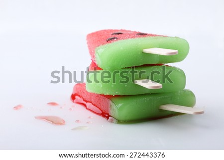 watermelon shaped ice cream pop stack on white background