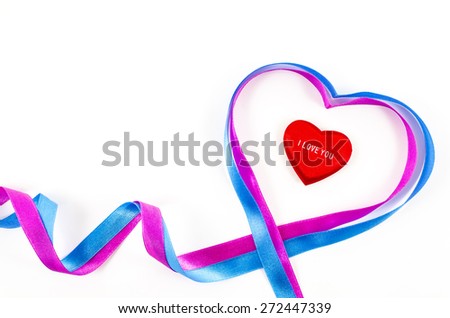 Heart shaped ribbon on white background