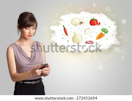 Pretty woman presenting a cloud of healthy nutritional vegetables concept