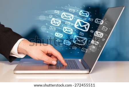 Concept of sending e-mails from your computer Royalty-Free Stock Photo #272455511