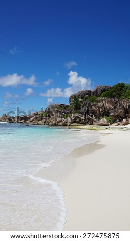 amazing summer day at tropical beach on la digue