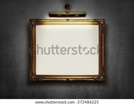 Picture frame with blank canvas hanging on a wall in an art museum