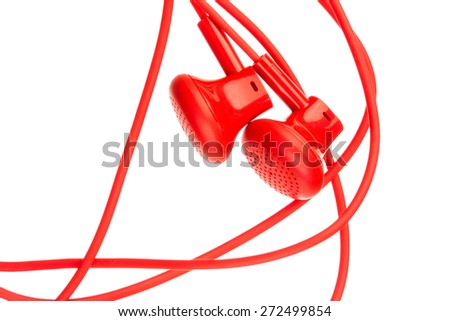 Close up on red earbuds isolated on white background