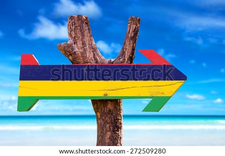 Mauritius Flag wooden sign with beach background