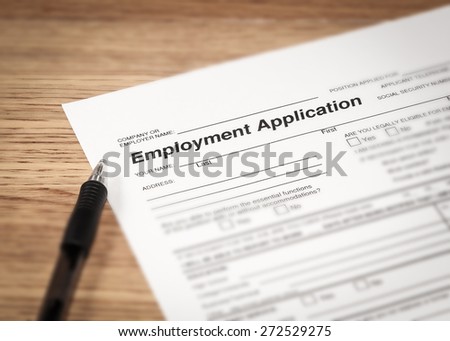 The drudges of filling in an application for employment. Royalty-Free Stock Photo #272529275