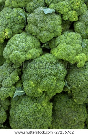 vertical picture of broccoli at the market
