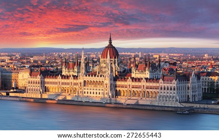 Budapest parliament at dramatic sunrise Royalty-Free Stock Photo #272655443