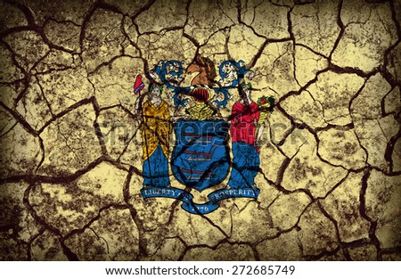New Jersey flag pattern on crack soil texture,retro vintage style