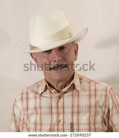 Cowboy in white hat
