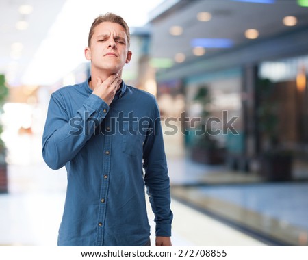 angry young-man suffering a throatache