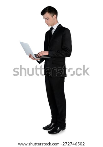 Isolated business man using laptop