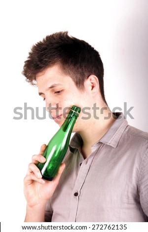 Boy with green bottle