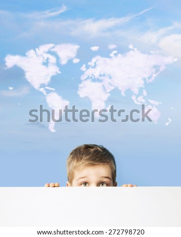 Small boy and cloud world map