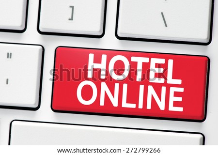 Computer white keyboard with motel online button
