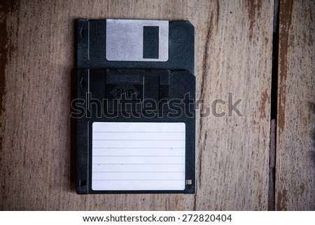 Floppy Disk On Wood Backgrounds