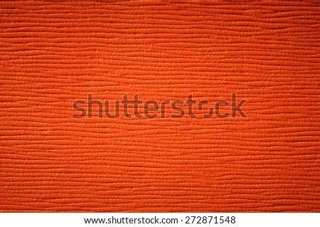 Orange leather texture for background.