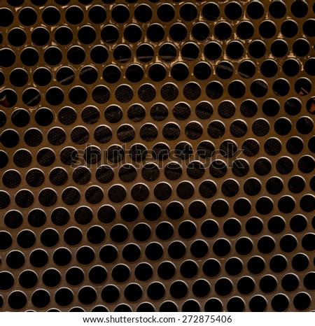 Texture of metal with holes - speaker front side. Texture useful as background